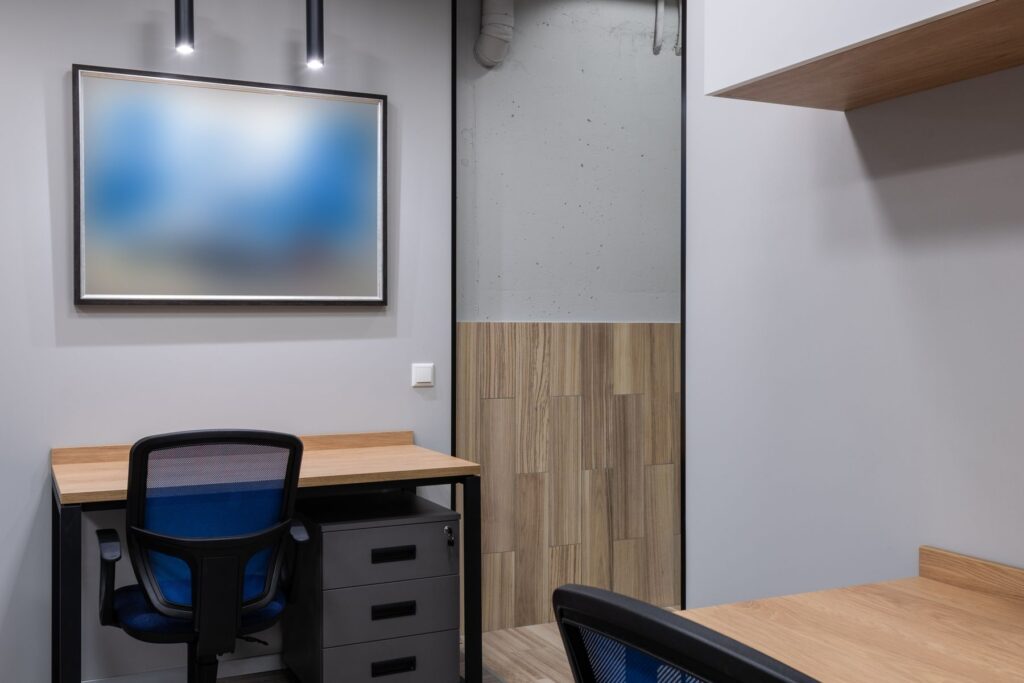 Organized modern office with clean desks and open work areas